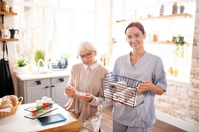 Caregiver helping with housekeeping